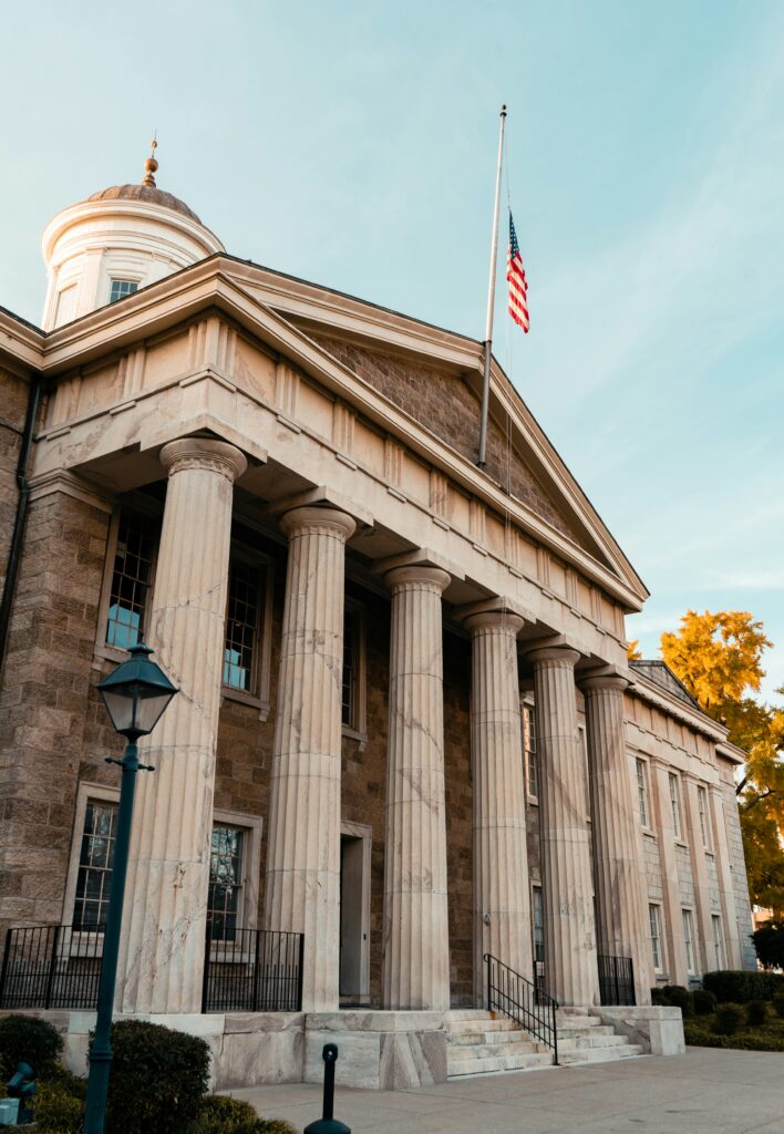 Legal gavel representing consequences of FMLA non-compliance for employers